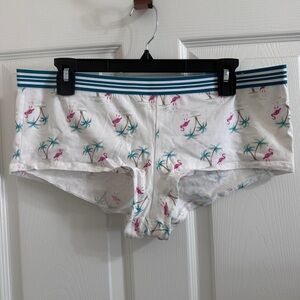 Cacique flamingo and palm trees boyShorts.